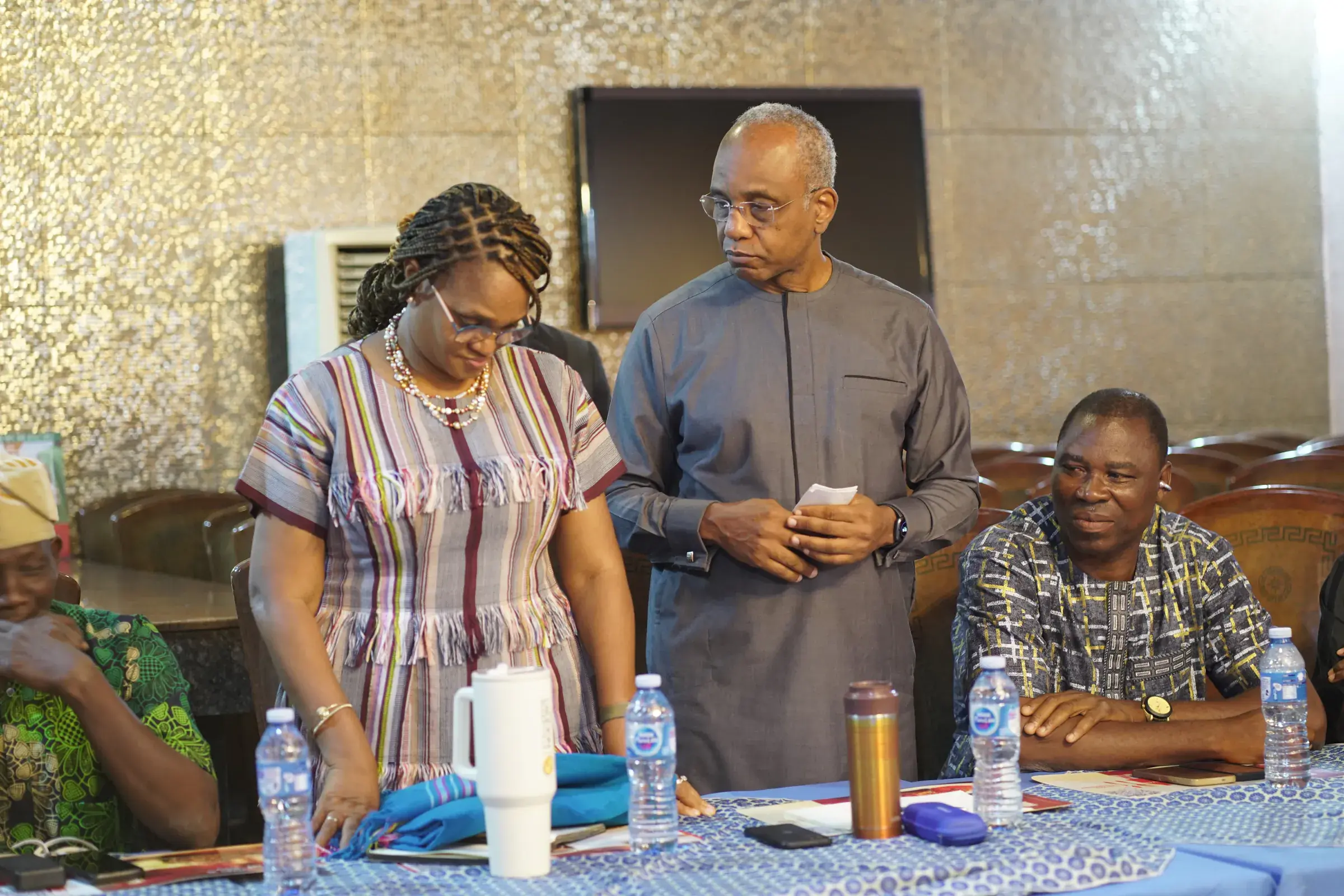 Funso Doherty with people at an NDC Lagos State executive meeting.