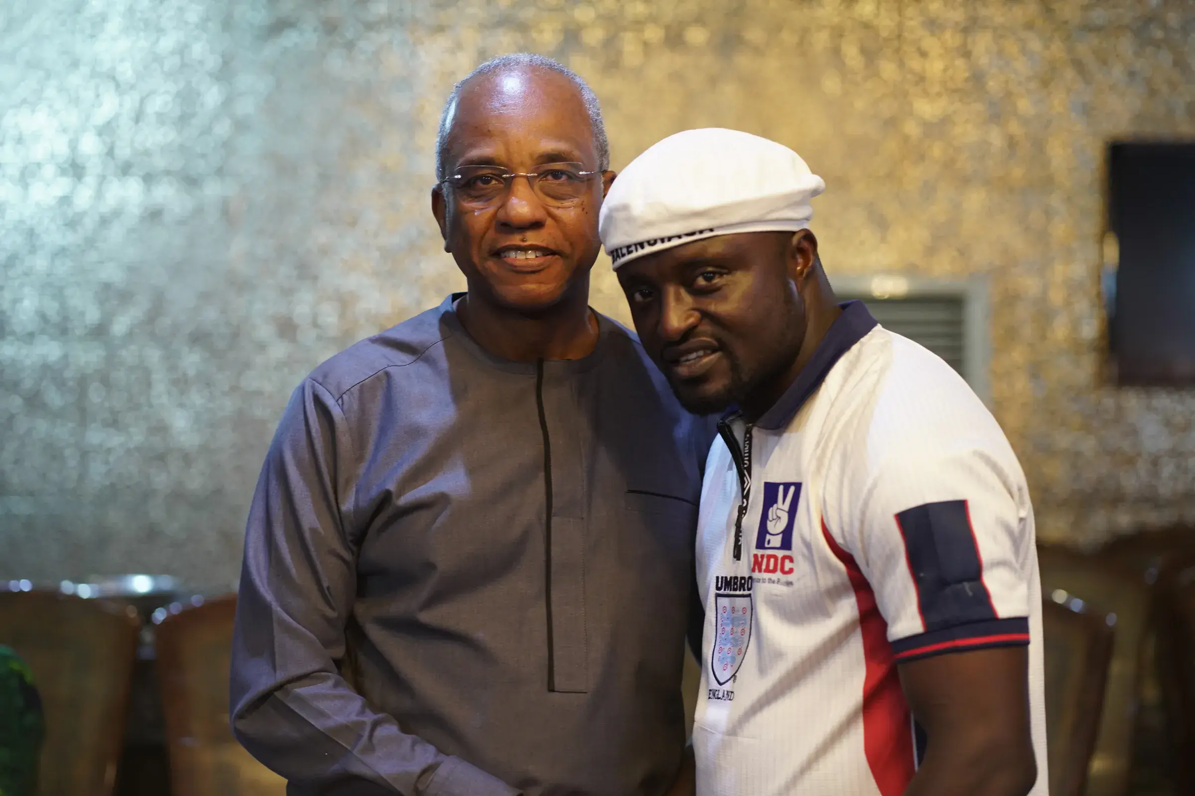 Funso Doherty with people at an NDC Lagos State executive meeting.